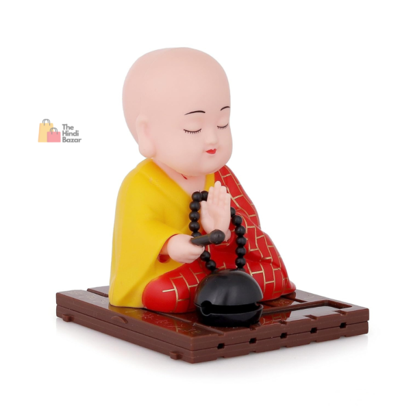 Sculpmart Solar-Powered Moving Head and Hand Sitting Gautam Buddha Statue – Ideal for Living Room, Car Dashboard, Home, Office Desk, and Symbol of Wealth & Prosperity (Red, 6 cm) - Image 4