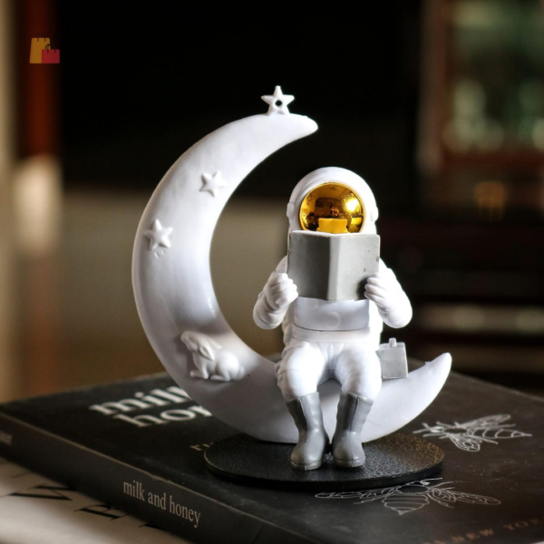 Astronaut Figurine Showpiece for Home Décor Idols for Office Desk Table Astronaut Toy for Car Dashboard, Statue for Gift Gifting Items Birthday Decoration (Reading on Moon - Golden), Space